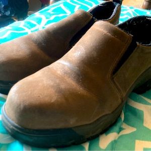 Woman’s size 9 slide in steel toe shoes